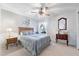 Cozy bedroom with natural light, a ceiling fan and comfortable furniture at 1202 Leisure World --, Mesa, AZ 85206