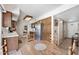 Functional kitchen with wood cabinets, modern appliances, and a cozy breakfast nook area at 1202 Leisure World --, Mesa, AZ 85206