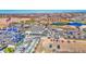 Unique aerial view showcasing the entertainment district and recreational park with mountain backdrop at 1280 W Blue Ridge Dr, San Tan Valley, AZ 85140