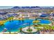 Breathtaking aerial view of the lake, the clubhouse and community features in a picturesque neighborhood at 1280 W Blue Ridge Dr, San Tan Valley, AZ 85140