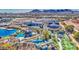 A vibrant aerial view of the community and its charming amenities, including lakes and recreational areas at 1280 W Blue Ridge Dr, San Tan Valley, AZ 85140
