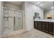Bathroom featuring a glass enclosed shower and double sink vanity at 1280 W Blue Ridge Dr, San Tan Valley, AZ 85140