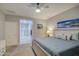 Bedroom with a ceiling fan and ensuite bathroom at 1280 W Blue Ridge Dr, San Tan Valley, AZ 85140