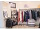 Walk-in closet with shelving, hanging rods, and ample storage space for clothing at 1280 W Blue Ridge Dr, San Tan Valley, AZ 85140