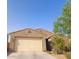 Charming single-story home featuring a two-car garage and desert landscaping at 1280 W Blue Ridge Dr, San Tan Valley, AZ 85140