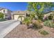 Charming single-story home with a well-manicured lawn and a two-car garage, offering great curb appeal at 1280 W Blue Ridge Dr, San Tan Valley, AZ 85140