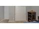 Hallway closet showcasing sleek sliding doors and a display shelf adding character to the space at 1280 W Blue Ridge Dr, San Tan Valley, AZ 85140