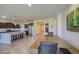 Open concept kitchen with stainless steel appliances and a large island with barstool seating at 1280 W Blue Ridge Dr, San Tan Valley, AZ 85140