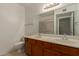 Bright bathroom featuring double vanity, large mirror, and updated fixtures at 13284 W Aleppo Dr, Sun City West, AZ 85375