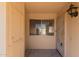 Welcoming entryway with a decorative door and screen, offering both style and functionality with natural lighting at 13284 W Aleppo Dr, Sun City West, AZ 85375