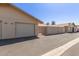 A low-angle view of the home's exterior reveals a paved driveway leading to the garage at 13284 W Aleppo Dr, Sun City West, AZ 85375