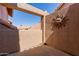 Private balcony with an architectural sun decoration and stucco wall at 1633 E Lakeside Dr # 106, Gilbert, AZ 85234