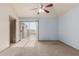 Comfortable bedroom with natural light and door leading to an outdoor balcony with views of the community at 1633 E Lakeside Dr # 106, Gilbert, AZ 85234