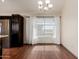 Bright dining area with wood floors, large window and chandelier at 1633 E Lakeside Dr # 106, Gilbert, AZ 85234
