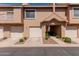 Charming townhome with private garage, covered entry, and well-maintained landscaping for a welcoming curb appeal at 1633 E Lakeside Dr # 106, Gilbert, AZ 85234