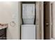 Conveniently located stacked washer and dryer adjacent to storage cabinets at 1633 E Lakeside Dr # 106, Gilbert, AZ 85234