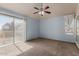 Bright Primary bedroom with sliding door to patio at 1633 E Lakeside Dr # 106, Gilbert, AZ 85234