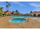 Community pool and spa, surrounded by comfortable lounge chairs and lush landscaping, for relaxation and recreation at 1633 E Lakeside Dr # 106, Gilbert, AZ 85234