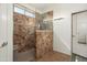 Modern bathroom with a tiled walk-in shower and a stylish vanity at 16564 W Wild Horse Way, Surprise, AZ 85387