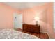 Comfortable bedroom featuring hardwood floors and plenty of natural light at 16564 W Wild Horse Way, Surprise, AZ 85387
