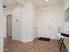 Inviting foyer with tile flooring and modern decor at 16564 W Wild Horse Way, Surprise, AZ 85387