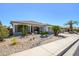 Beautiful single-story home with low-maintenance desert landscaping and a charming facade at 17637 W Browning Dr, Surprise, AZ 85374