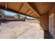 Wide angle view of the large backyard and block wall, offering privacy and space at 1833 E Redfield Rd, Phoenix, AZ 85022