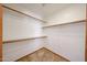This closet offers plenty of space for storage with shelving all around at 1833 E Redfield Rd, Phoenix, AZ 85022