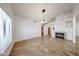 Bright dining area with chandelier, vaulted ceilings, tile floors, and lots of natural light at 1833 E Redfield Rd, Phoenix, AZ 85022