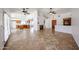 Bright living room featuring a fireplace, tile floors, vaulted ceilings and an open floor plan at 1833 E Redfield Rd, Phoenix, AZ 85022