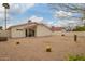 Desert landscaped backyard with a covered patio perfect for entertaining at 1838 E Crocus Dr, Phoenix, AZ 85022