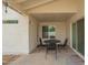 Cozy covered patio with outdoor seating and a view of the backyard at 1838 E Crocus Dr, Phoenix, AZ 85022
