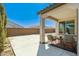 Spacious patio area with seating, perfect for outdoor entertaining at 19181 W Jackson St, Buckeye, AZ 85326