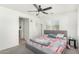 Bedroom features a ceiling fan and a bathroom ensuite at 1926 W Busoni Pl, Phoenix, AZ 85023