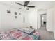 Bedroom with ceiling fan and carpeted floor at 1926 W Busoni Pl, Phoenix, AZ 85023