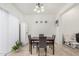 Cozy dining area illuminated by stylish lighting with seating for four at 1926 W Busoni Pl, Phoenix, AZ 85023