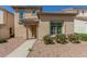 Charming single-Gathering home featuring desert landscaping, a tile roof, and a covered entry at 1926 W Busoni Pl, Phoenix, AZ 85023