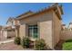 Charming single-Gathering home featuring desert landscaping, a tile roof, and a covered entry at 1926 W Busoni Pl, Phoenix, AZ 85023
