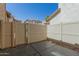 View of a private patio enclosed by beige fences and a clear blue sky at 1926 W Busoni Pl, Phoenix, AZ 85023