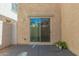 Enjoy outdoor living on the private patio with sliding door and stucco walls at 1926 W Busoni Pl, Phoenix, AZ 85023
