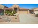 Charming single-story home with desert landscaping, tile roof, and two-car garage in a desirable location at 22499 N Dietz Dr, Maricopa, AZ 85138