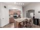 Well-lit kitchen with a large island, stainless appliances, and a functional layout for cooking and entertaining at 22499 N Dietz Dr, Maricopa, AZ 85138