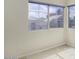 Bright bedroom featuring large windows offering plenty of natural light and neighborhood views at 228 W Bolero Dr, Tempe, AZ 85284