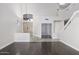 Inviting foyer with hardwood floors, high ceilings, and a staircase leading to the second floor at 228 W Bolero Dr, Tempe, AZ 85284