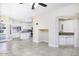 Open concept kitchen with white cabinets, granite countertops, and an island at 228 W Bolero Dr, Tempe, AZ 85284