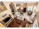 Open concept living area with kitchen island, dining space, and a living room with a beautiful open floor plan at 2741 N 137Th Ave, Goodyear, AZ 85395