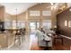Open living space with high ceilings, hardwood floors, and a view of the outdoor patio at 2741 N 137Th Ave, Goodyear, AZ 85395