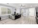 Bright office with tile floors, plantation shutters, modern ceiling fan and built in safe near the door at 3535 E Crescent Way, Gilbert, AZ 85298