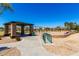 Neighborhood park with picnic shelter, playground equipment, and open green space, creating a vibrant community gathering spot at 3535 E Crescent Way, Gilbert, AZ 85298