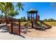 Community playground with climbing structure and slide, offering a fun and engaging recreational space for children at 3535 E Crescent Way, Gilbert, AZ 85298